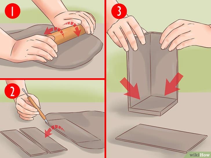 Moldando a argila com as mãos Moldando a argila com as mãos