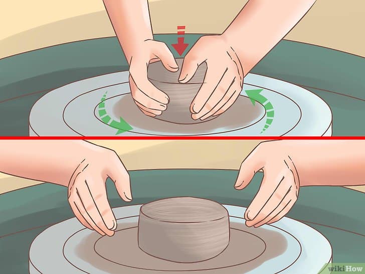 Moldando a argila com as mãos Moldando a argila com as mãos