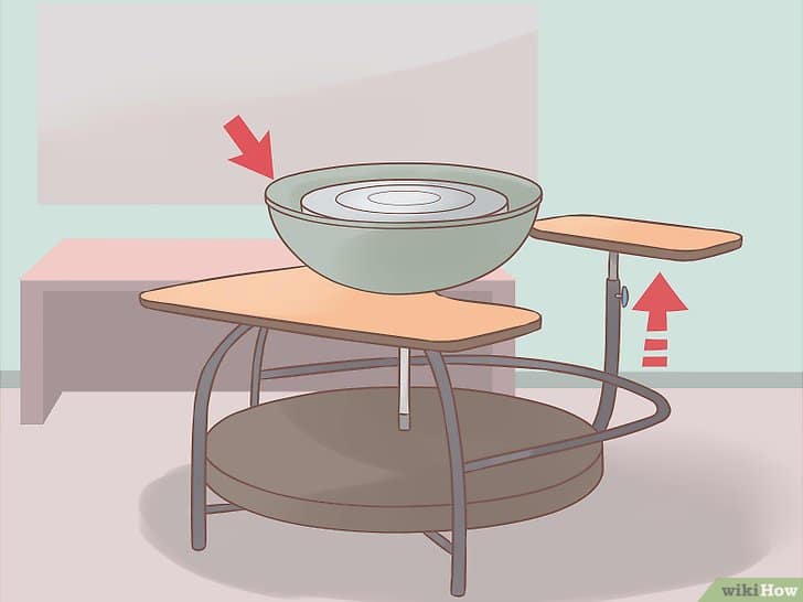 Argila - Usando a roda de oleiro Argila - Usando a roda de oleiro